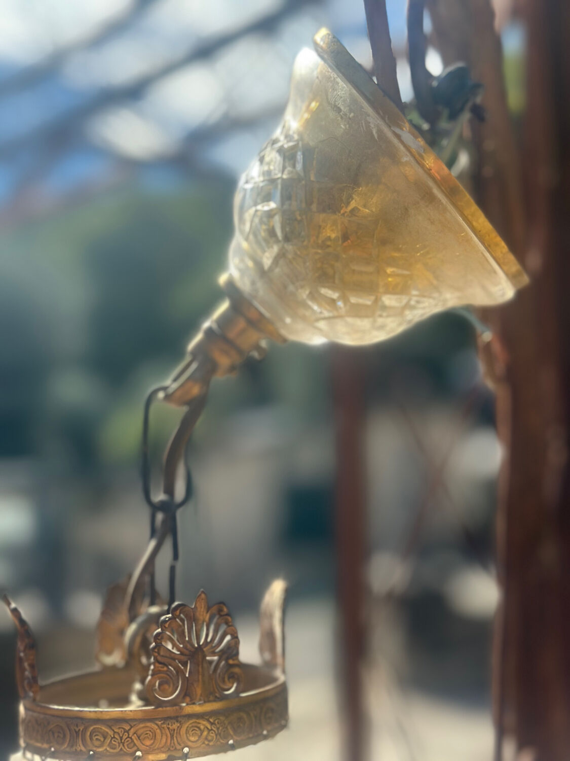Basket chandelier with crystal and gilded brass pendants, circa 1930.