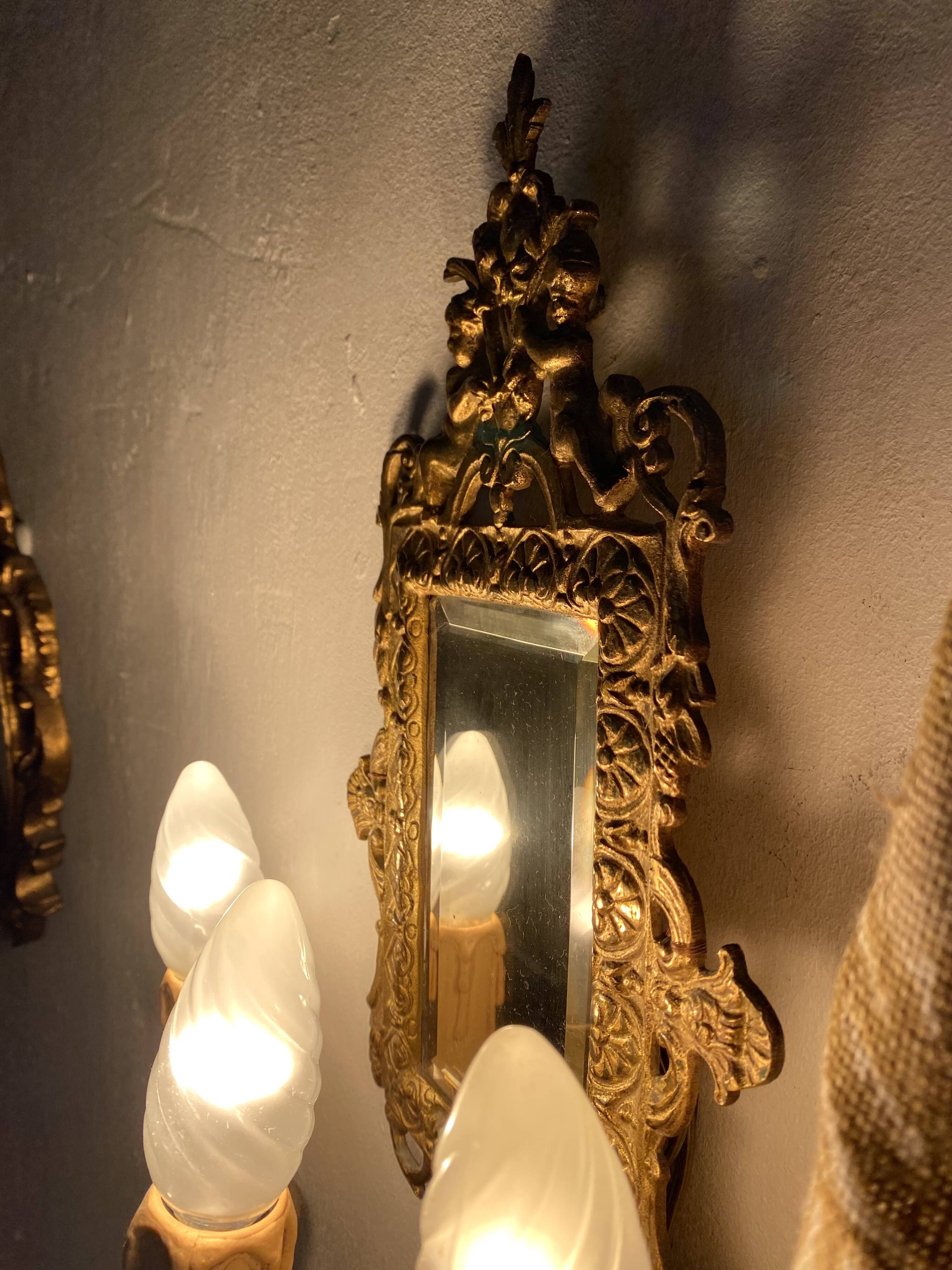 19th-century Napoleon III style gilded bronze wall sconce with bevelled mirror.