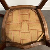 Pair of Victorian English chairs known as balloon chairs in solid mahogany.