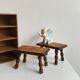 Pair of stools, footrests in solid turned wood