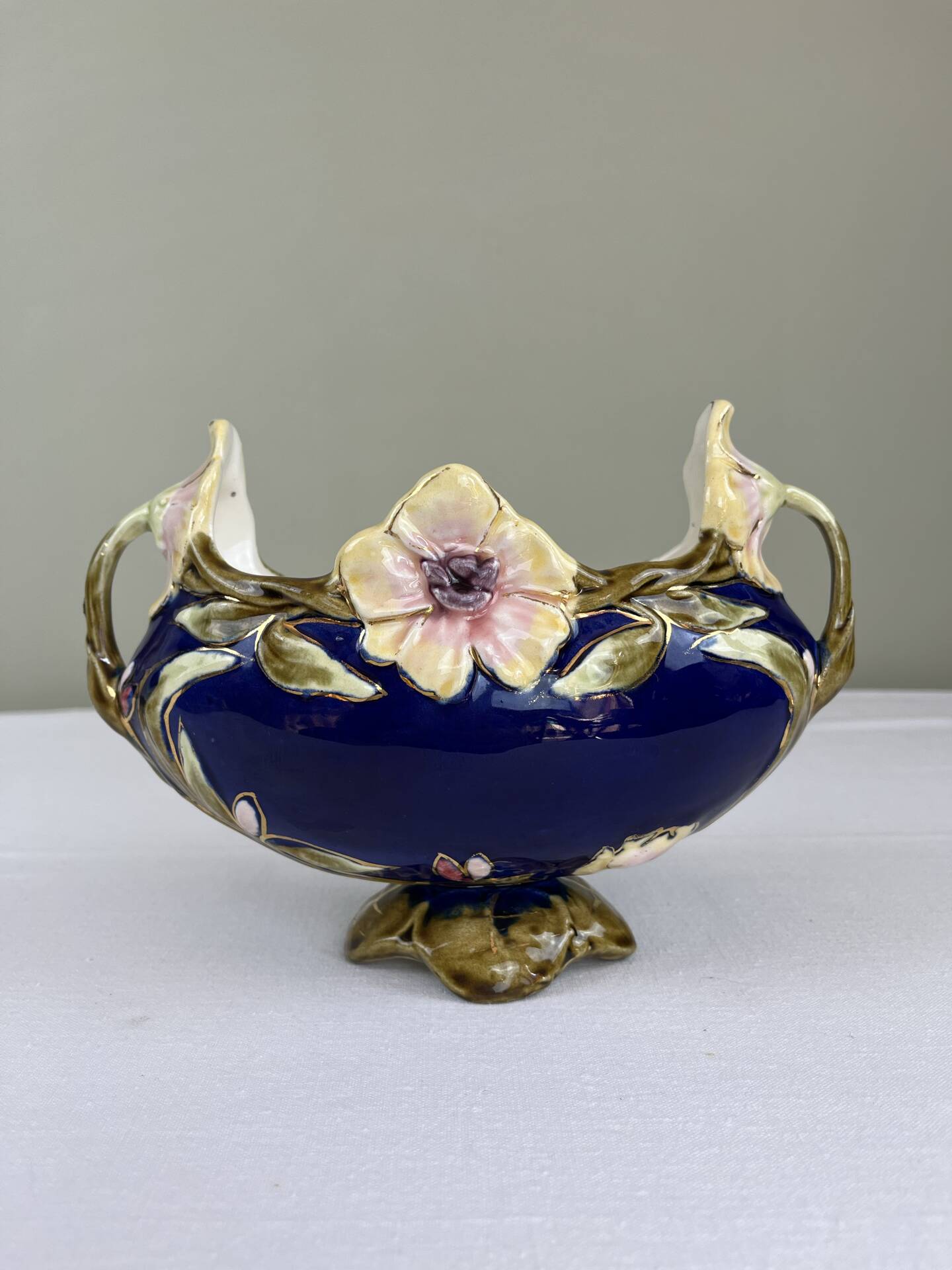 Art Nouveau navy blue barbotine bowl with raised floral decoration