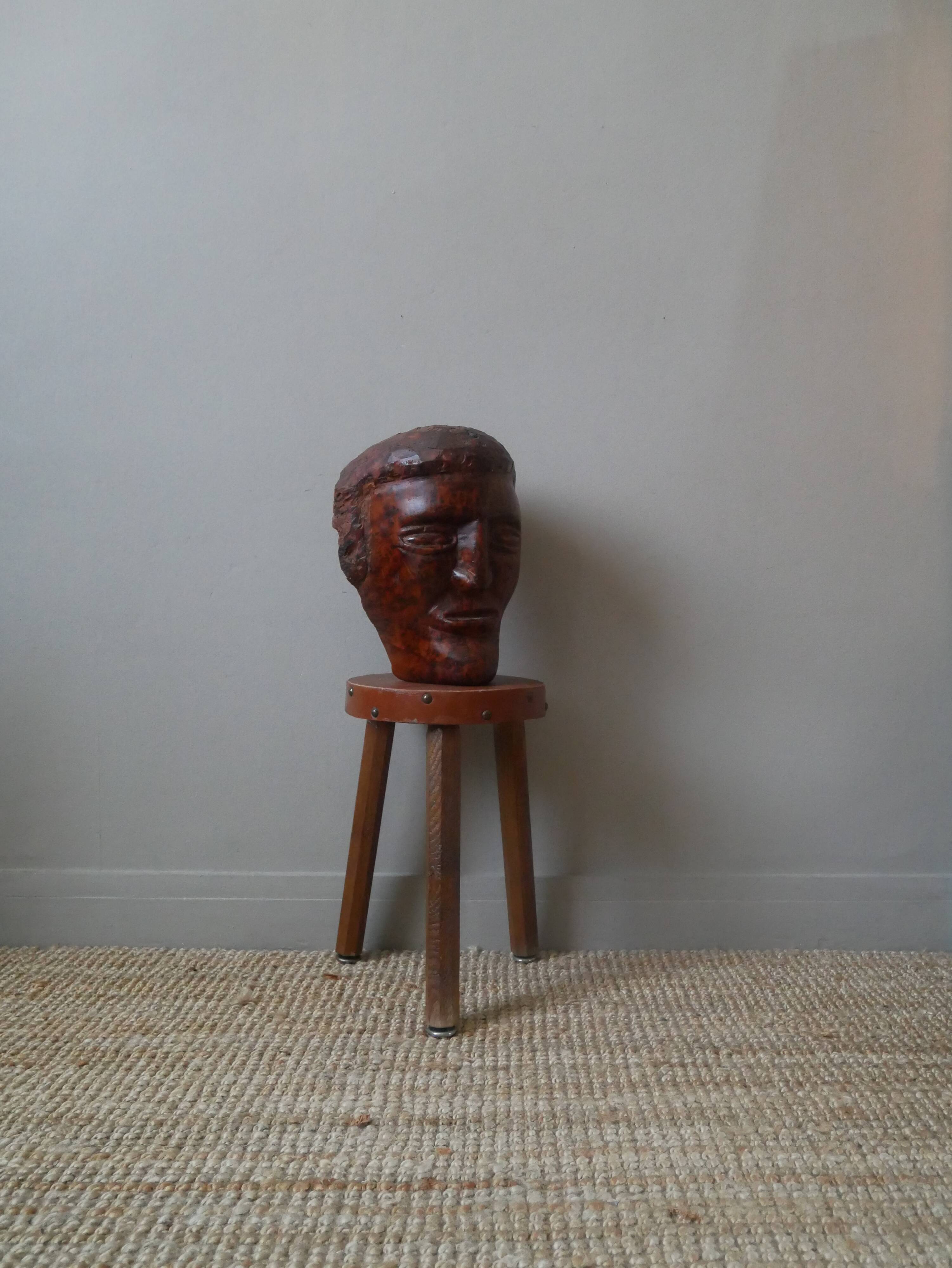 Wooden sculpture ethnic man's head handcrafted tribal decorative object workshop