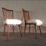 Pair of vintage Scandinavian Hygge chairs in solid wood and synthetic Mongolian sheepskin seat