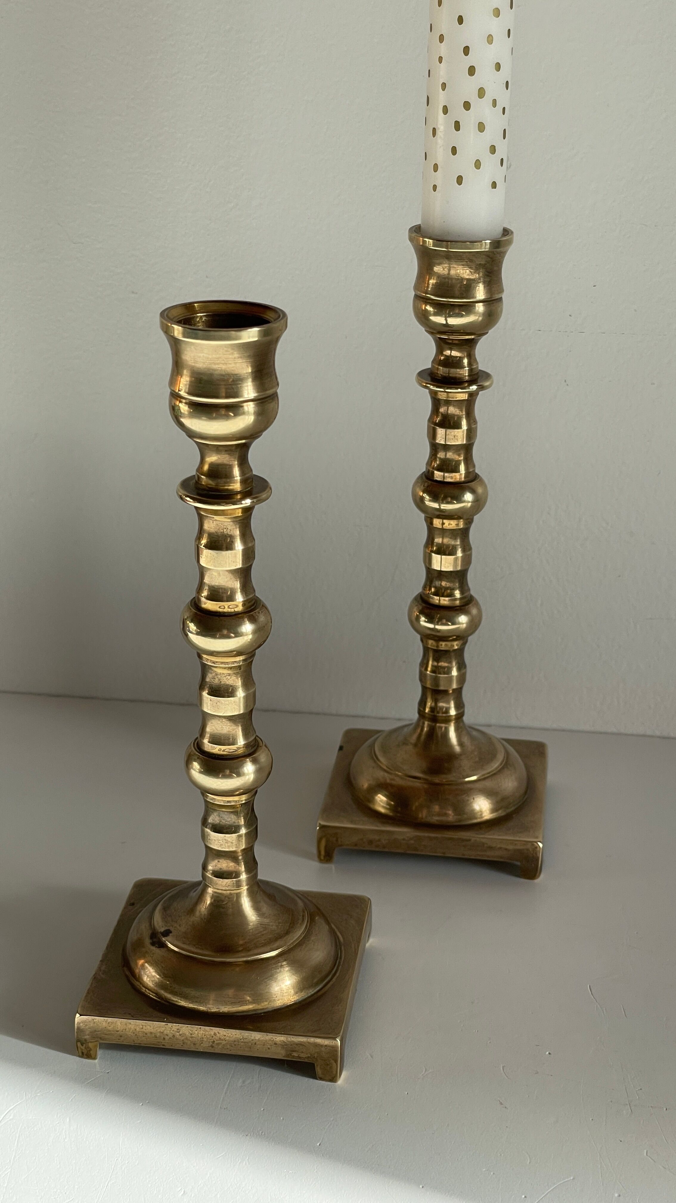 Pair of brass candle holders made in England