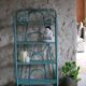 Blue rattan shelf