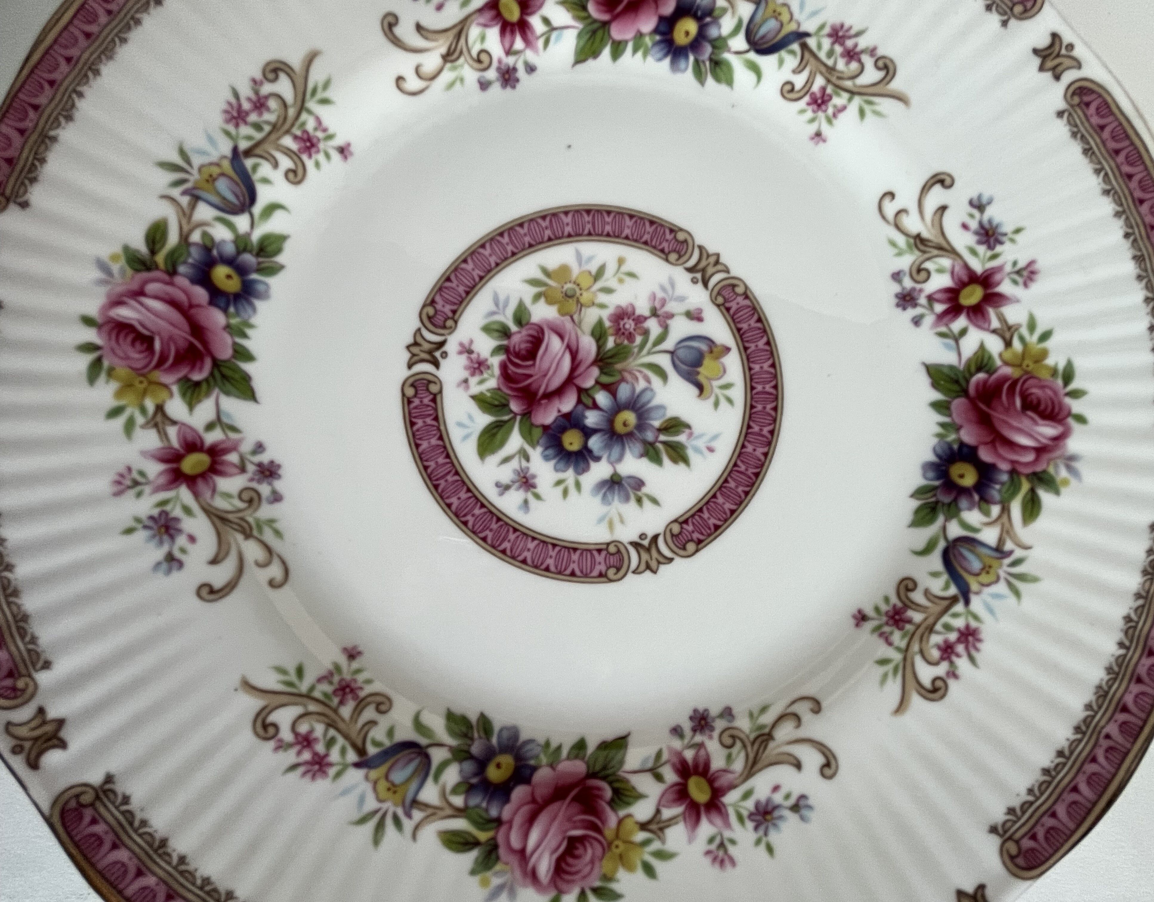 10 porcelain plates and a dish