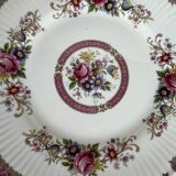 10 porcelain plates and a dish