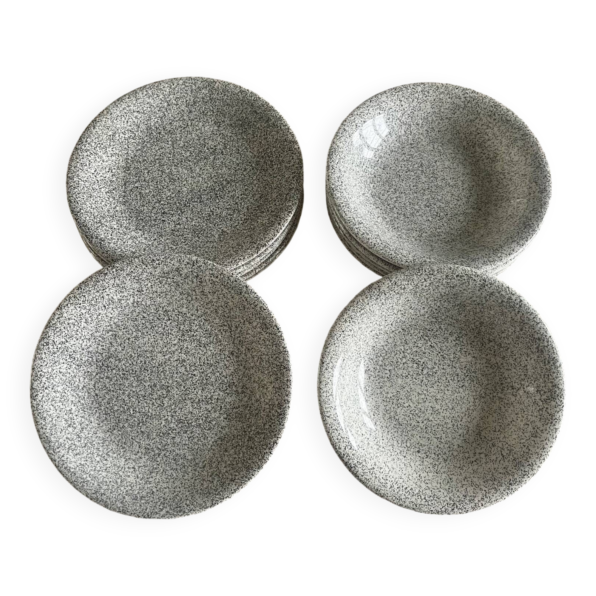 12 speckled ceramic plates.