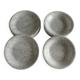 12 speckled ceramic plates.