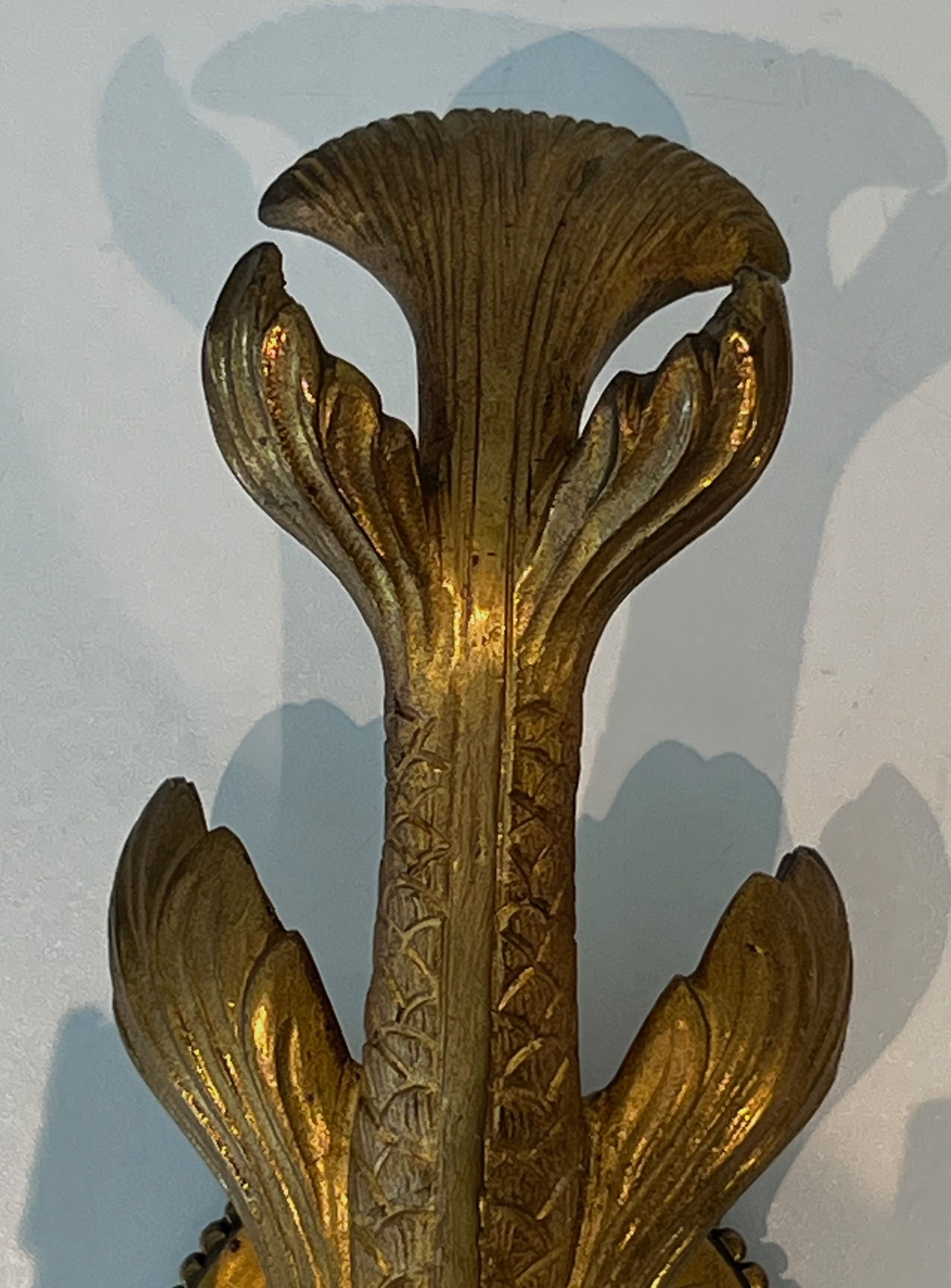Pair of bronze wall sconces with dolphins by Maison Jansen