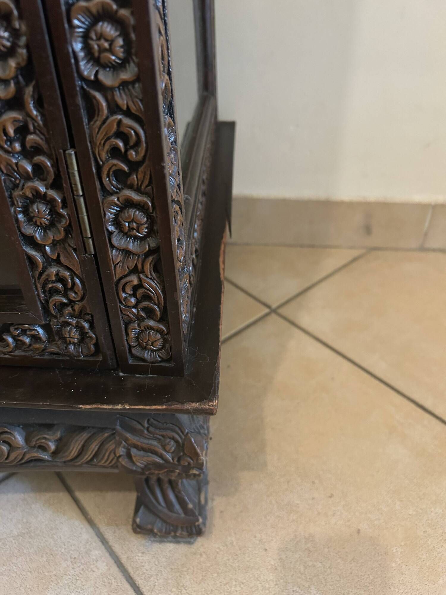 Thai trapezoidal display cabinet in carved solid wood