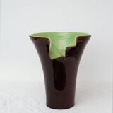 Brown and green vase with open edge rolled up