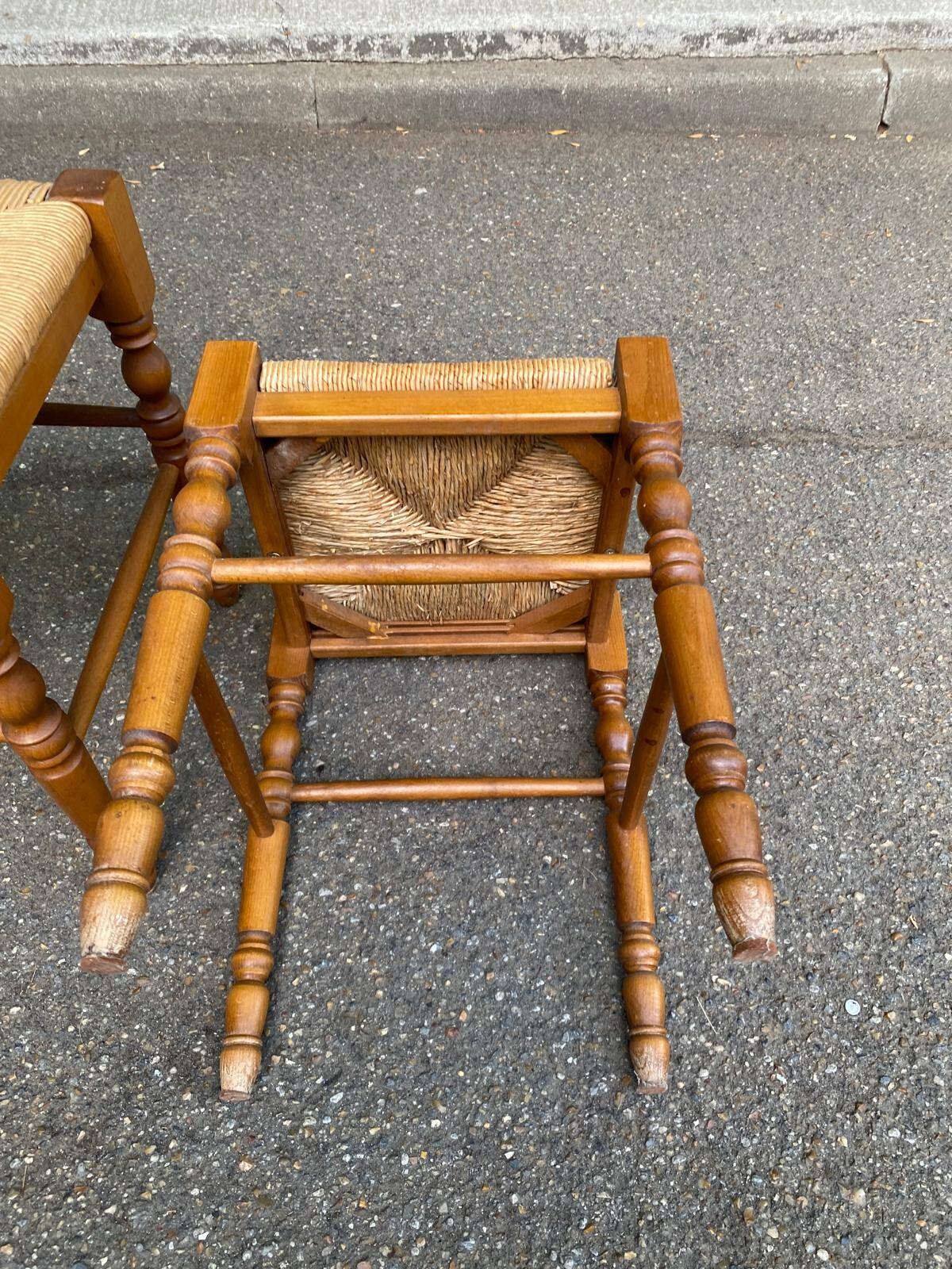 2 square stools made of carved solid wood with rush seats from the 1970s.