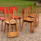 Eight wooden and formica chairs