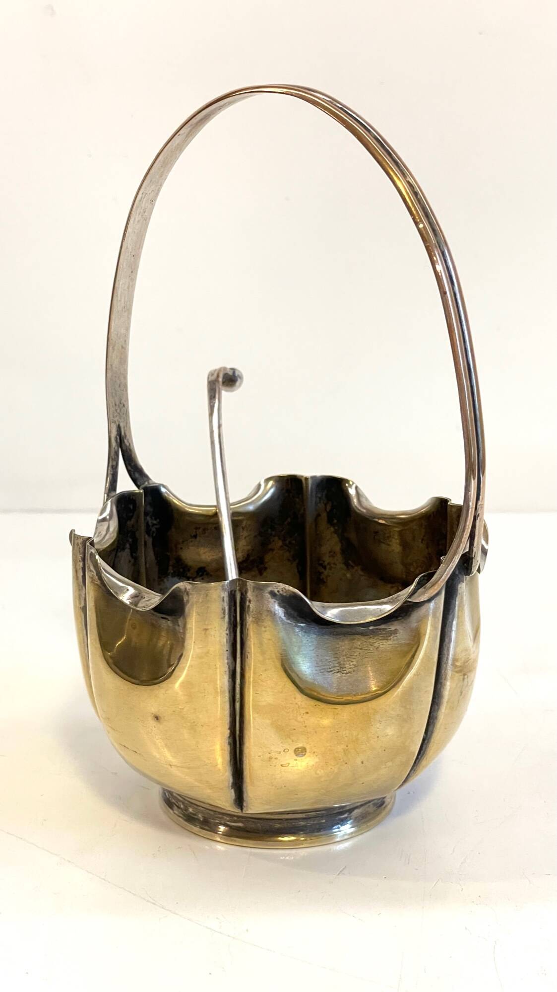 silver metal sugar bowl with gold patina