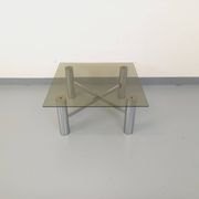 Square Italian vintage Space Age coffee table in smoked glass and metal.