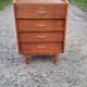 Chest of drawers of the 50s in rosewood spindle feet and fins