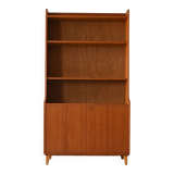 Vintage bookcase with storage compartment