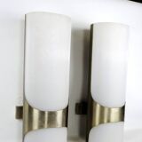 Brushed metal and ribbed opal plastic wall lights