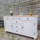 Buffet en bois patiné blanc