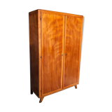 Vintage wooden cabinet with compass feet