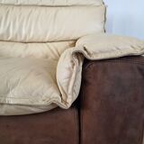 Fauteuil avec pouf en cuir et daim