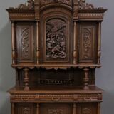 Important two-body buffet in solid walnut, richly carved in pure Renaissance style.