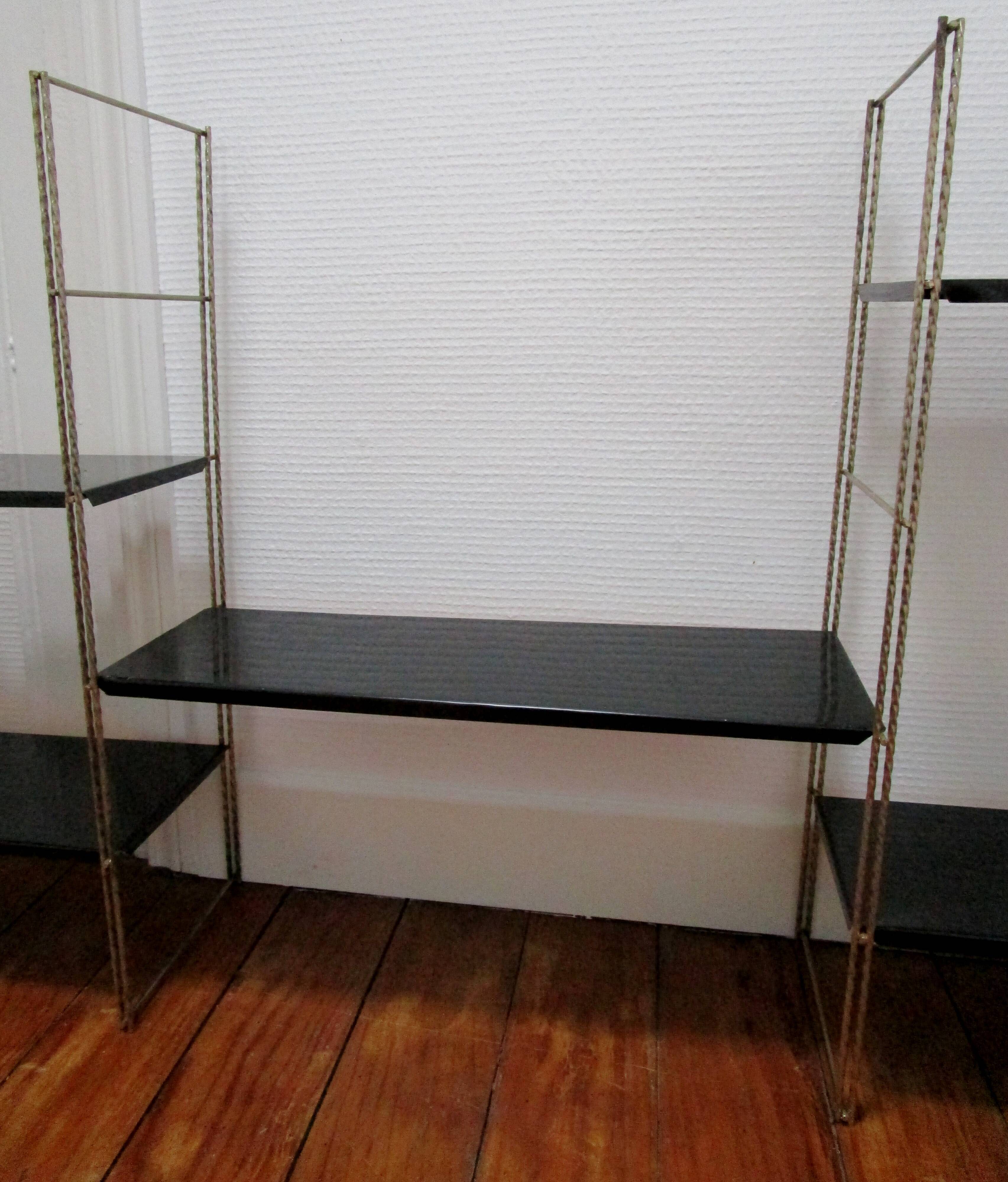 Black and gold metal tomado wall shelf