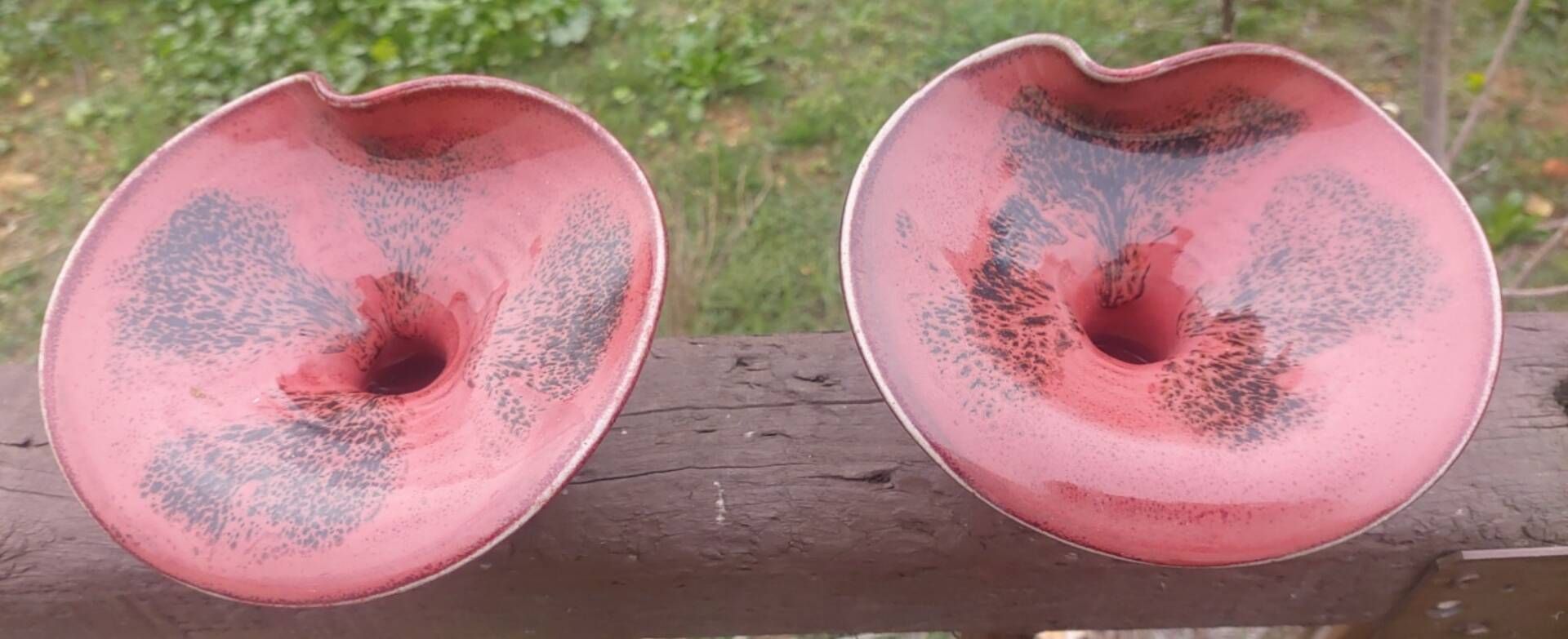 Pair of speckled red and black glazed stoneware ceramics – Signature
