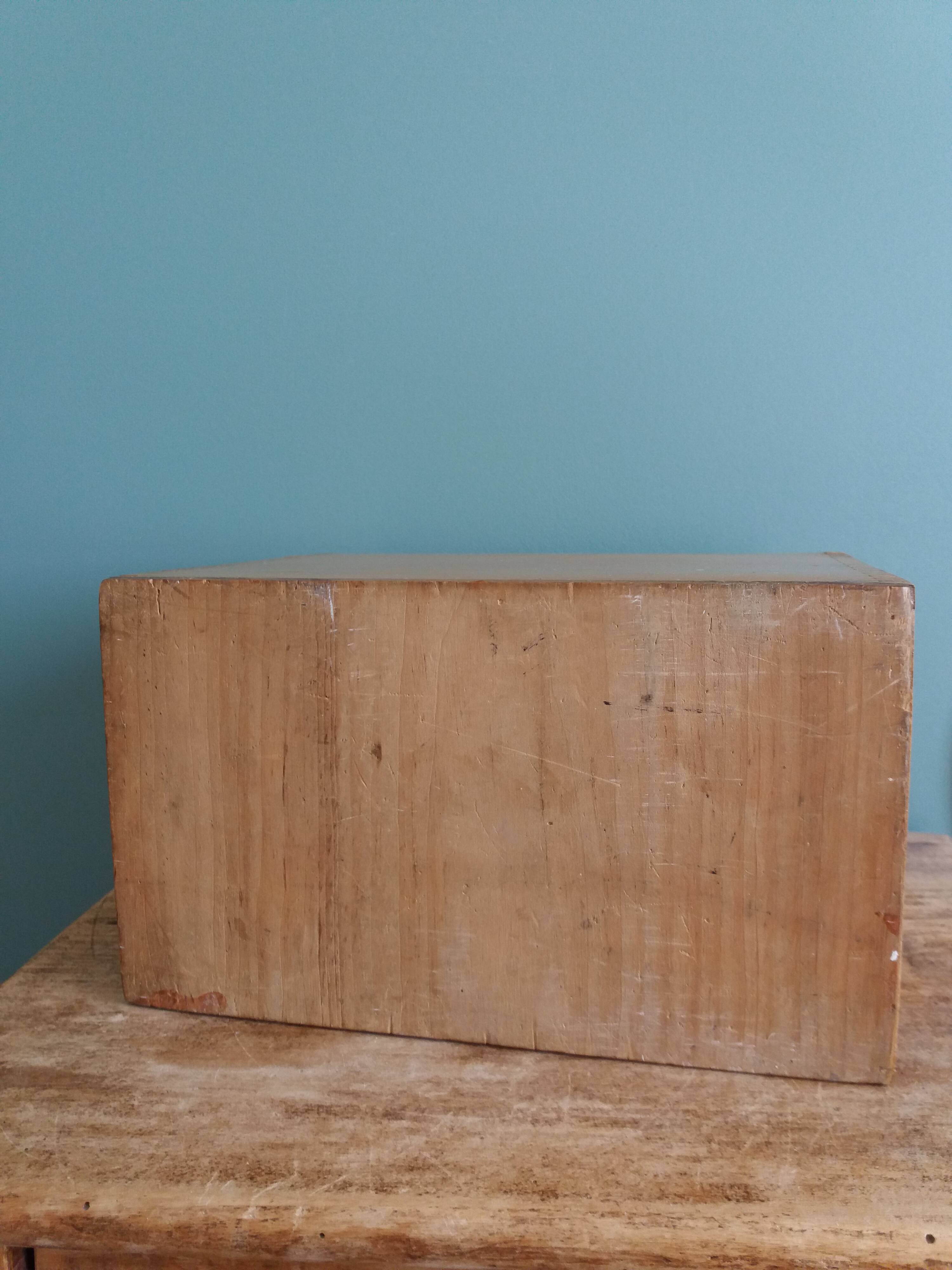 Wooden storage box, empty pocket