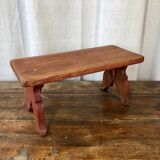 Red wooden footrest