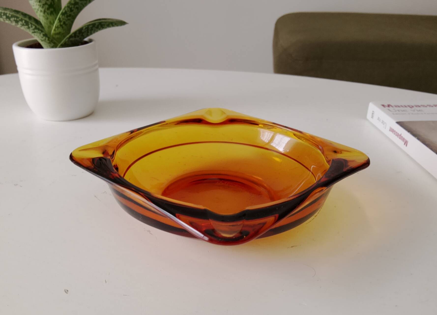 Vintage amber Duralex ashtray from the 1970s.