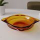 Vintage amber Duralex ashtray from the 1970s.