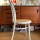White wooden and canning bistro chair