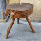 Tabouret tripode en bois brut