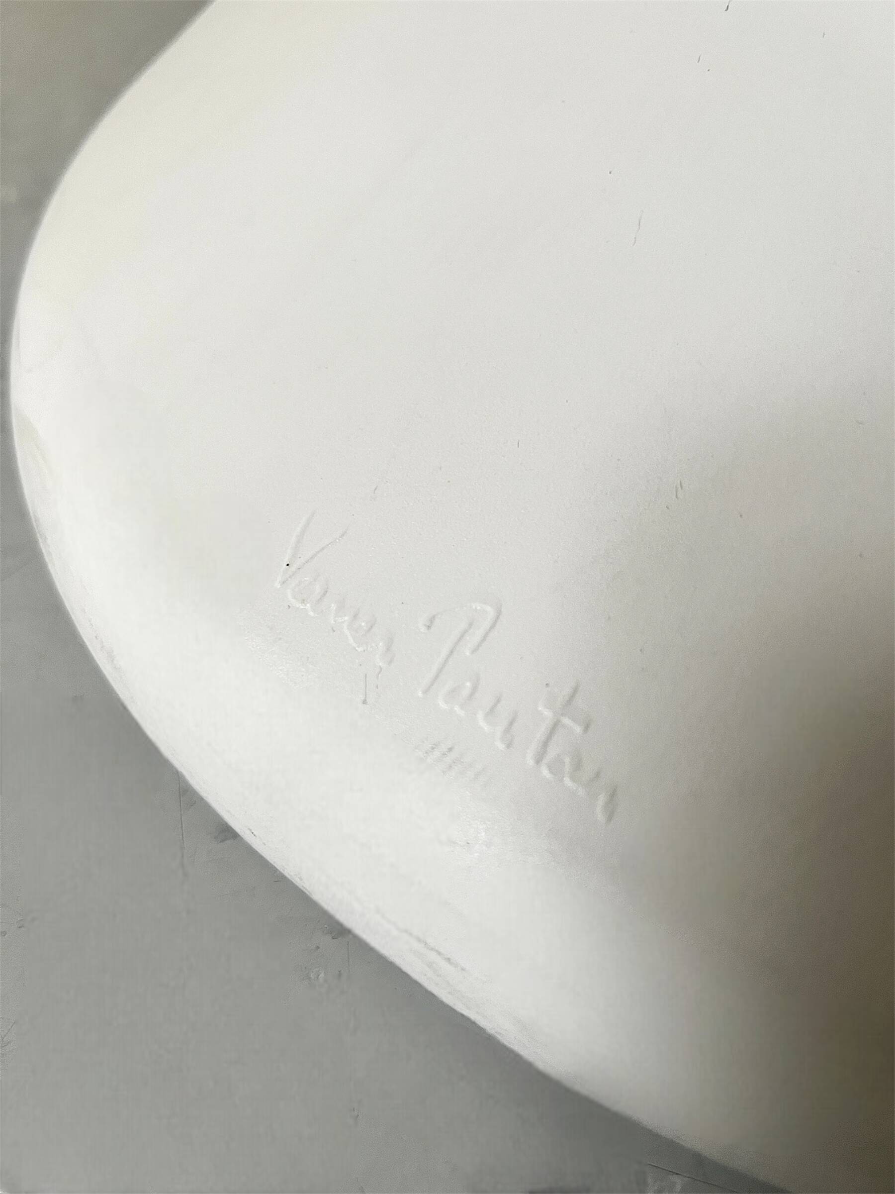 White monobloc design chair by Verner Panton, white edition Vitra.