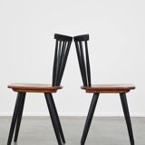 Set of 2 beautiful 1960s vintage Scandinavian design dining chairs with spindle backrests