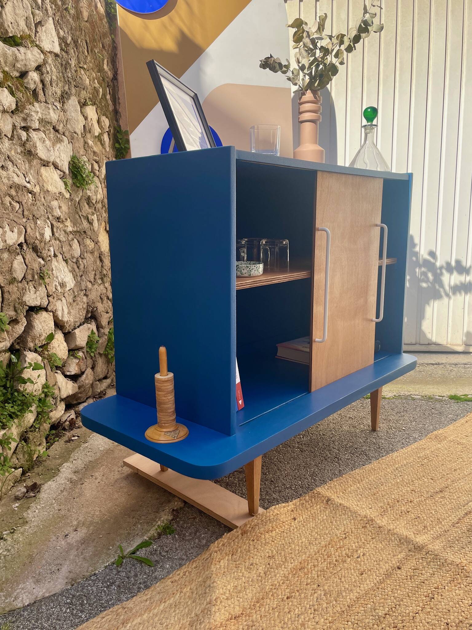 Upcycled buffet with sliding door