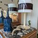 Art Deco wooden furniture with a swivelling mirror and marble top.