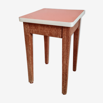 Wooden wax stool and orange formica