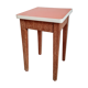Wooden wax stool and orange formica