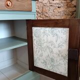 Buffet made of natural wood and bronze green.