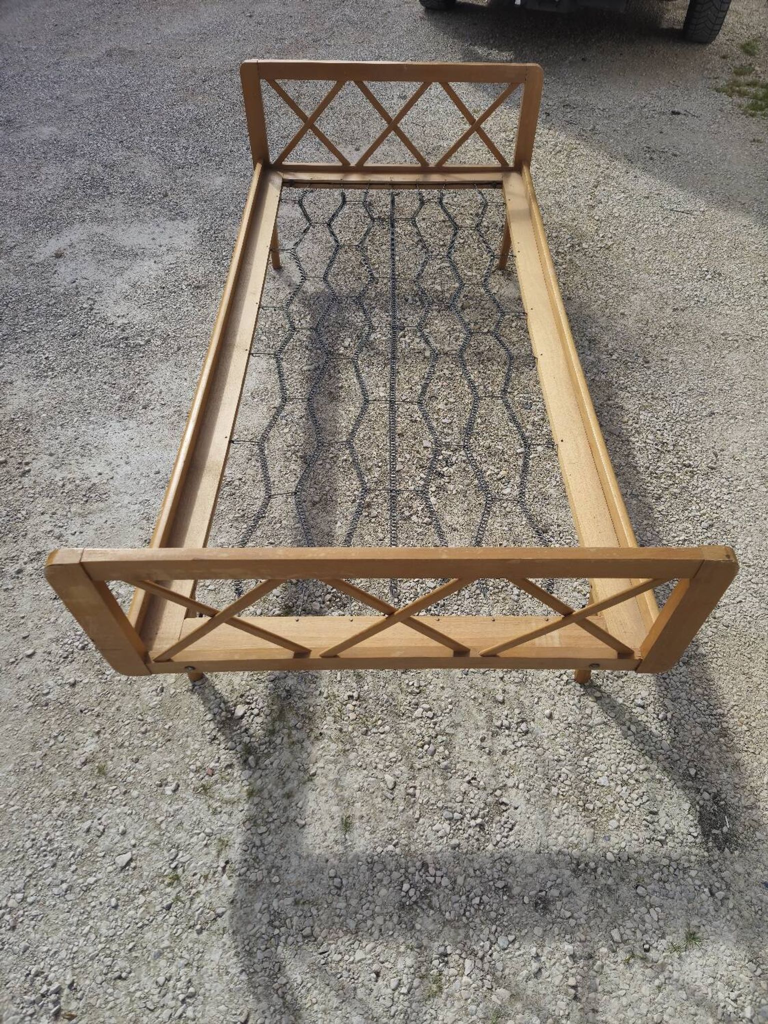 Vintage bed with compass feet from the 1950s