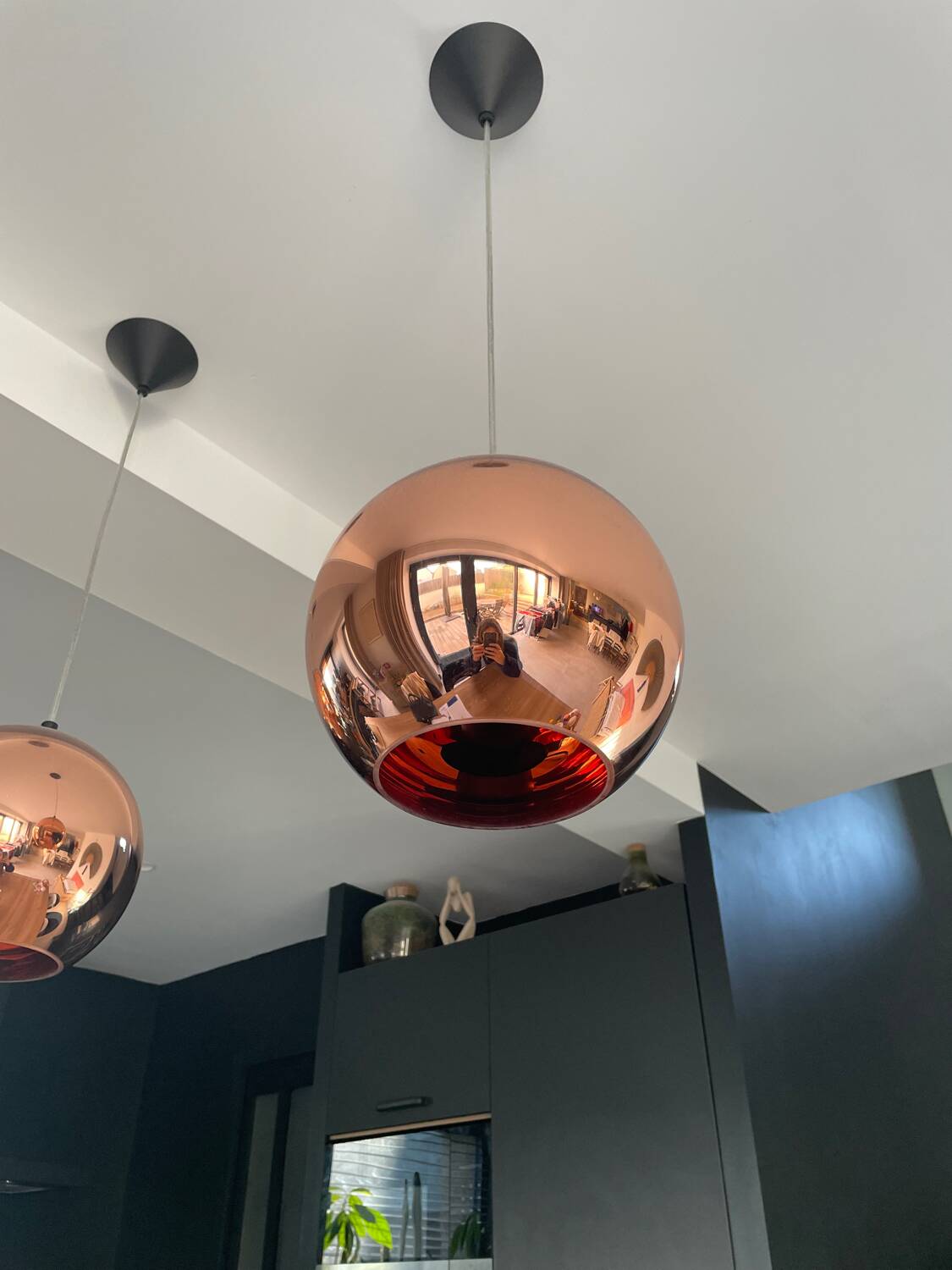 Copper Tom Dixon pendant lights individually