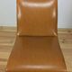 Pair of 1950s chairs with compass legs and brown faux leather.