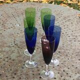 Set of 7 champagne flutes in colored glass and transparent base, vintage