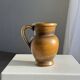 Speckled stoneware jug with grape pattern H17