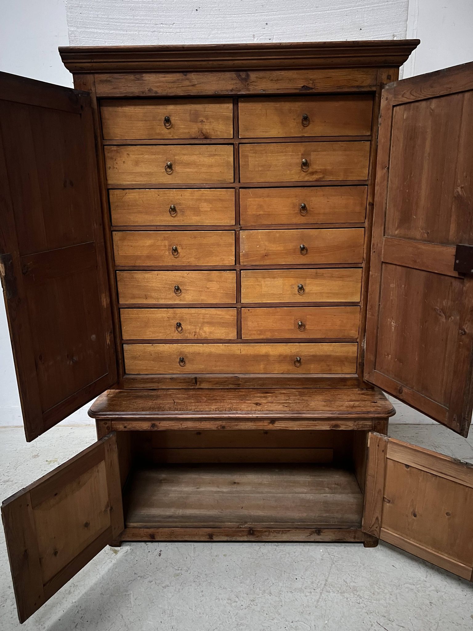 Two-part office furniture made of solid pine from the 20th century.