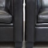 Set of 2 black sheepskin Art Deco design armchairs with high seating comfort