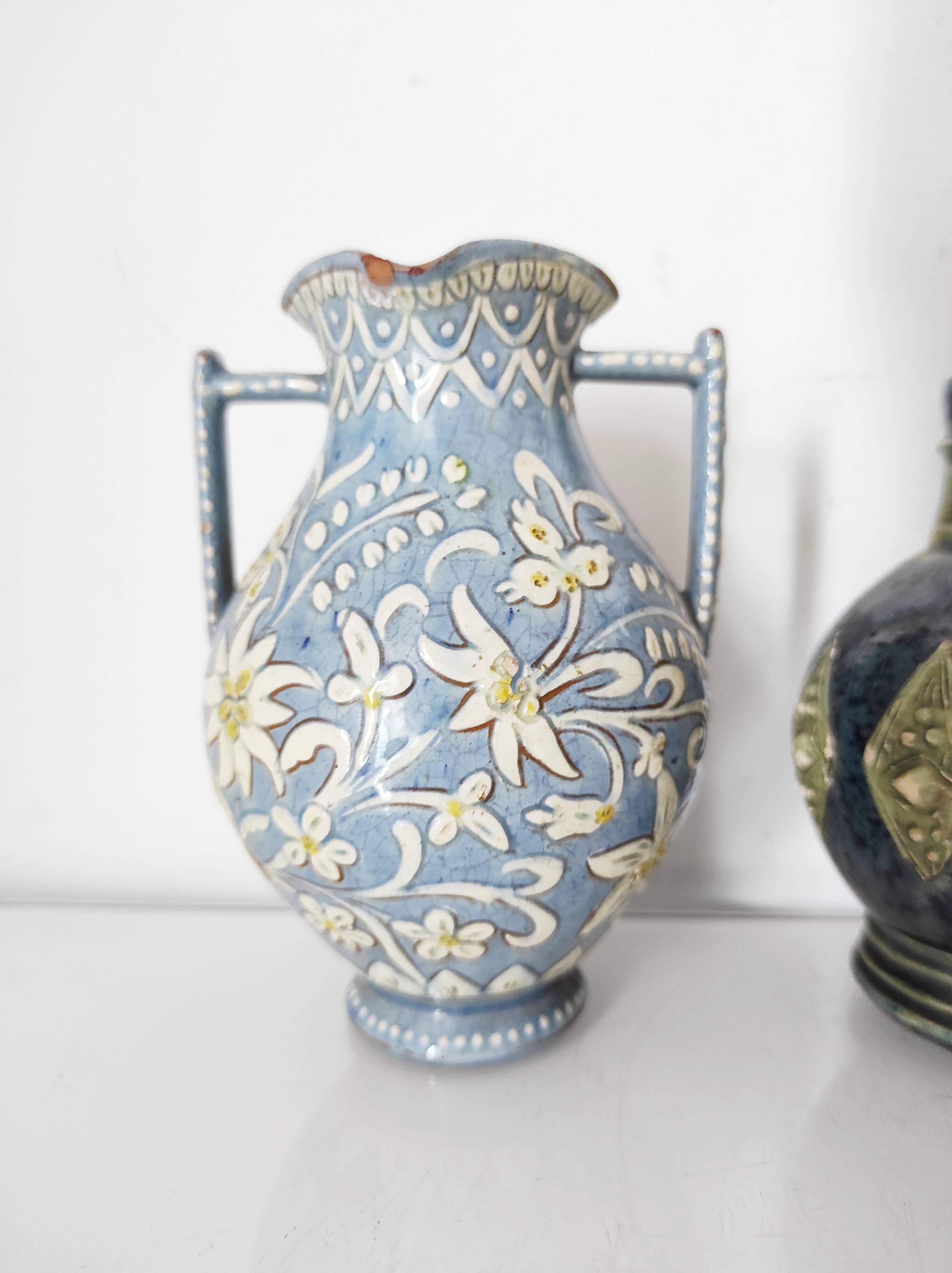 Two small blue ceramic vases